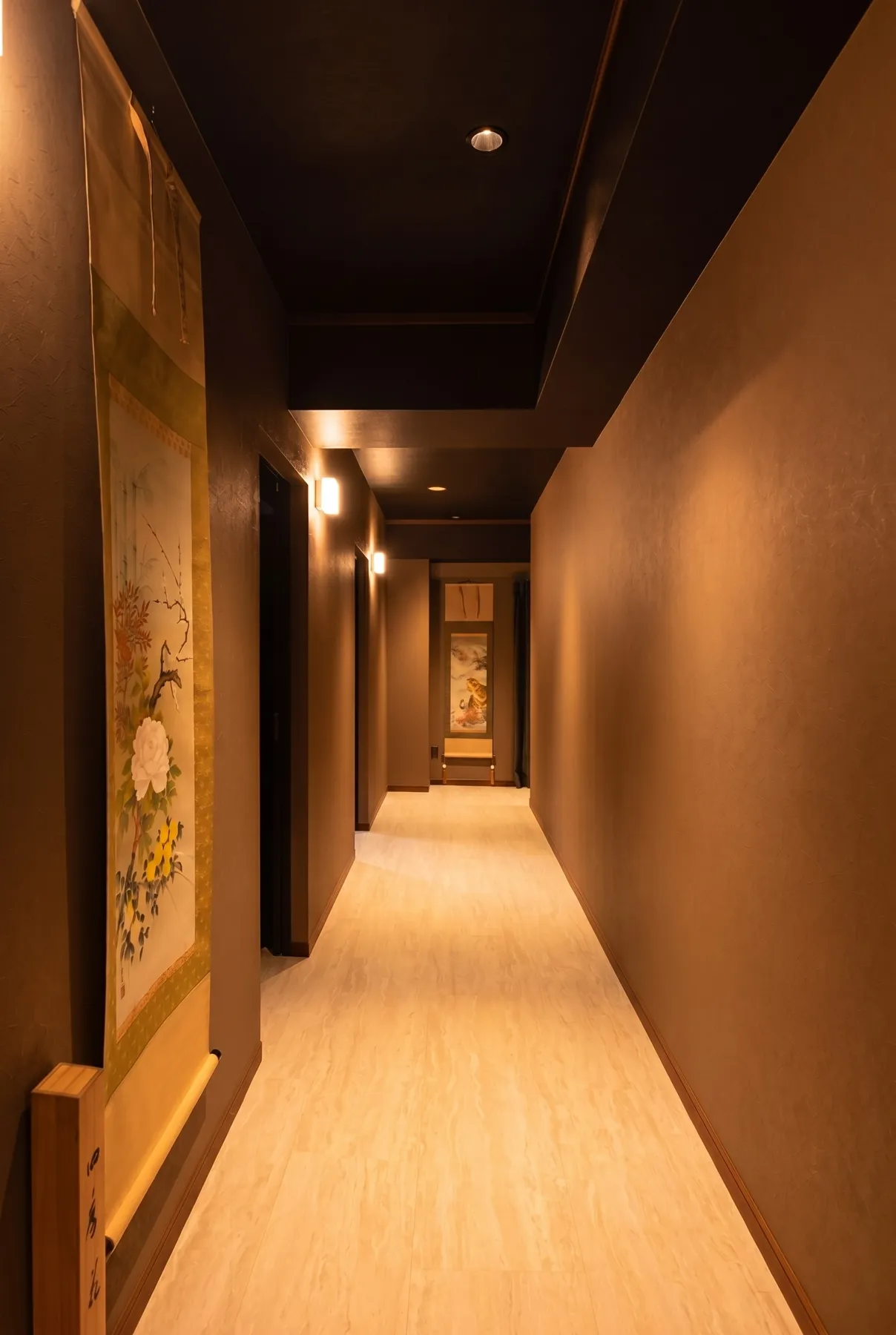 Interior hallway with Japanese scrolls at Evis Ink Tokyo